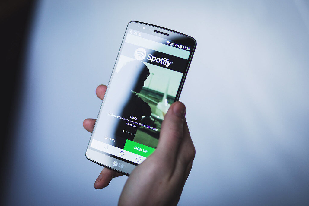 hand holding phone app screen